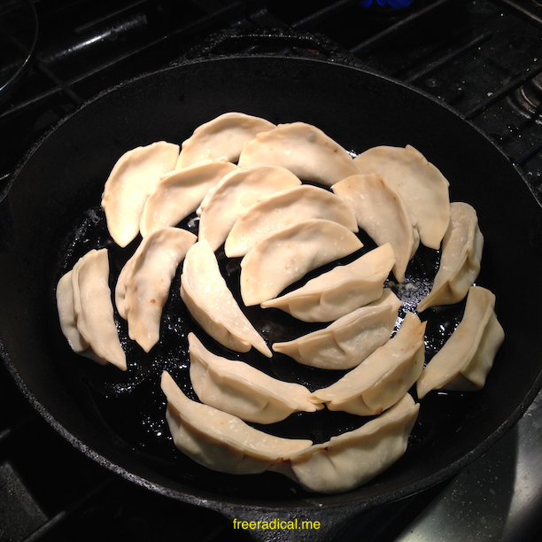 Place potstickers in the wok
